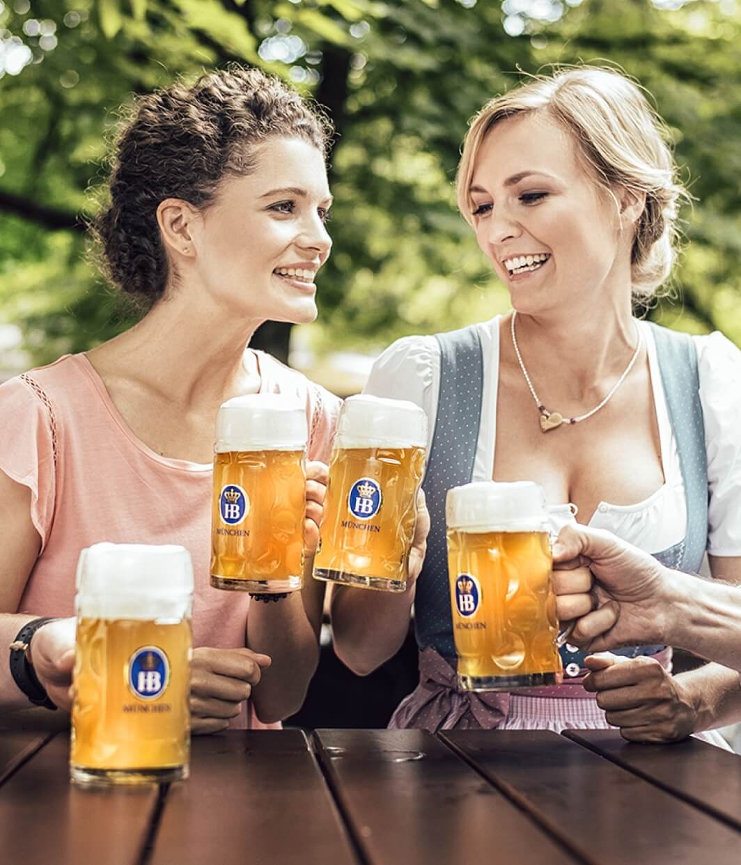 Girls enjoying hofbrauhaus beer